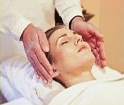 Reiki. Gentle holding touch.