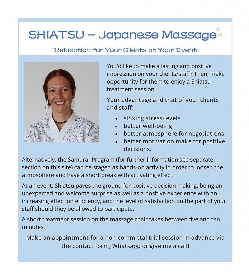 Shiatsu on stage at an event.